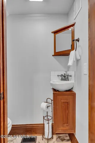 a kitchen with stainless steel appliances granite countertop a stove top oven a refrigerator and a granite counter tops