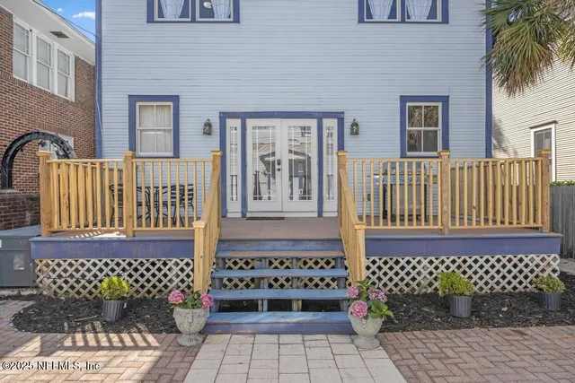 a kitchen with stainless steel appliances granite countertop a stove a sink dishwasher and a refrigerator