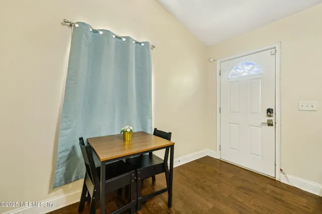 a view of a field with an ocean