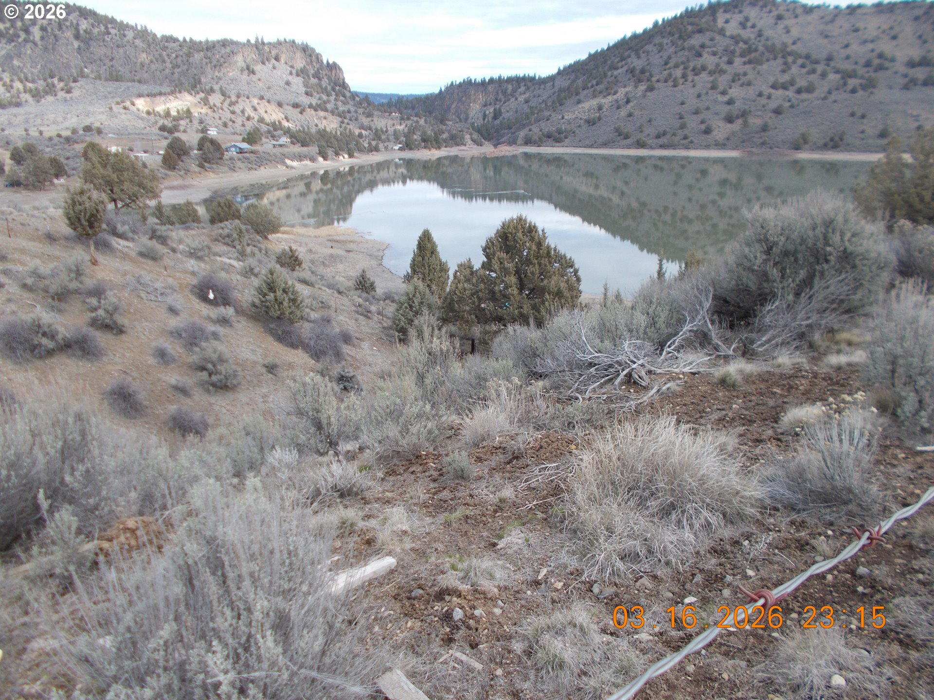 31841 Rice Road Unity, OR 97884 - Photo 9 of 27 a view of a lake with mountain in the background