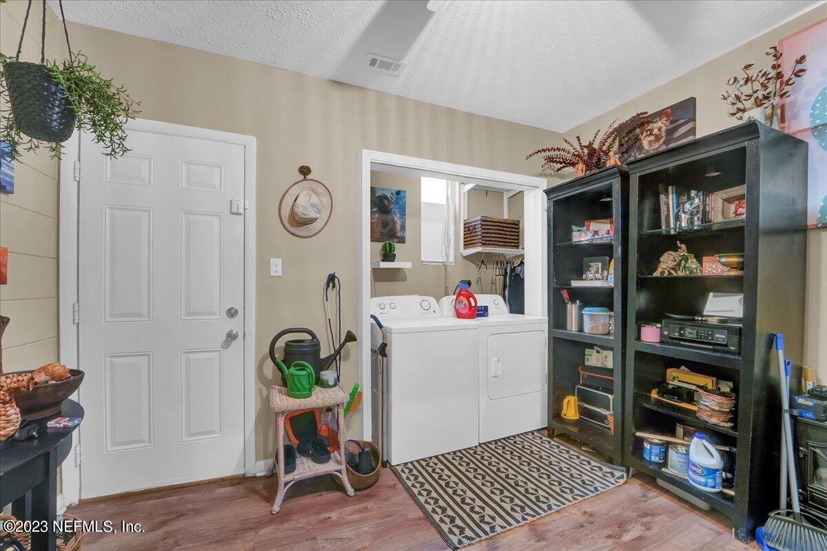 1975 Talladega Road Jacksonville, FL 32209 - Photo 12 of 15 a view of living room with furniture and rug