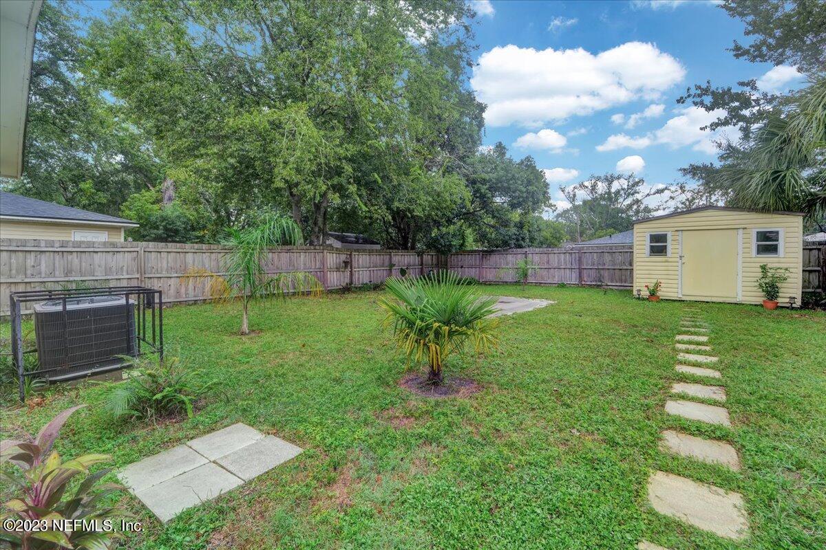 1975 Talladega Road Jacksonville, FL 32209 - Photo 14 of 15 a view of a backyard with a garden