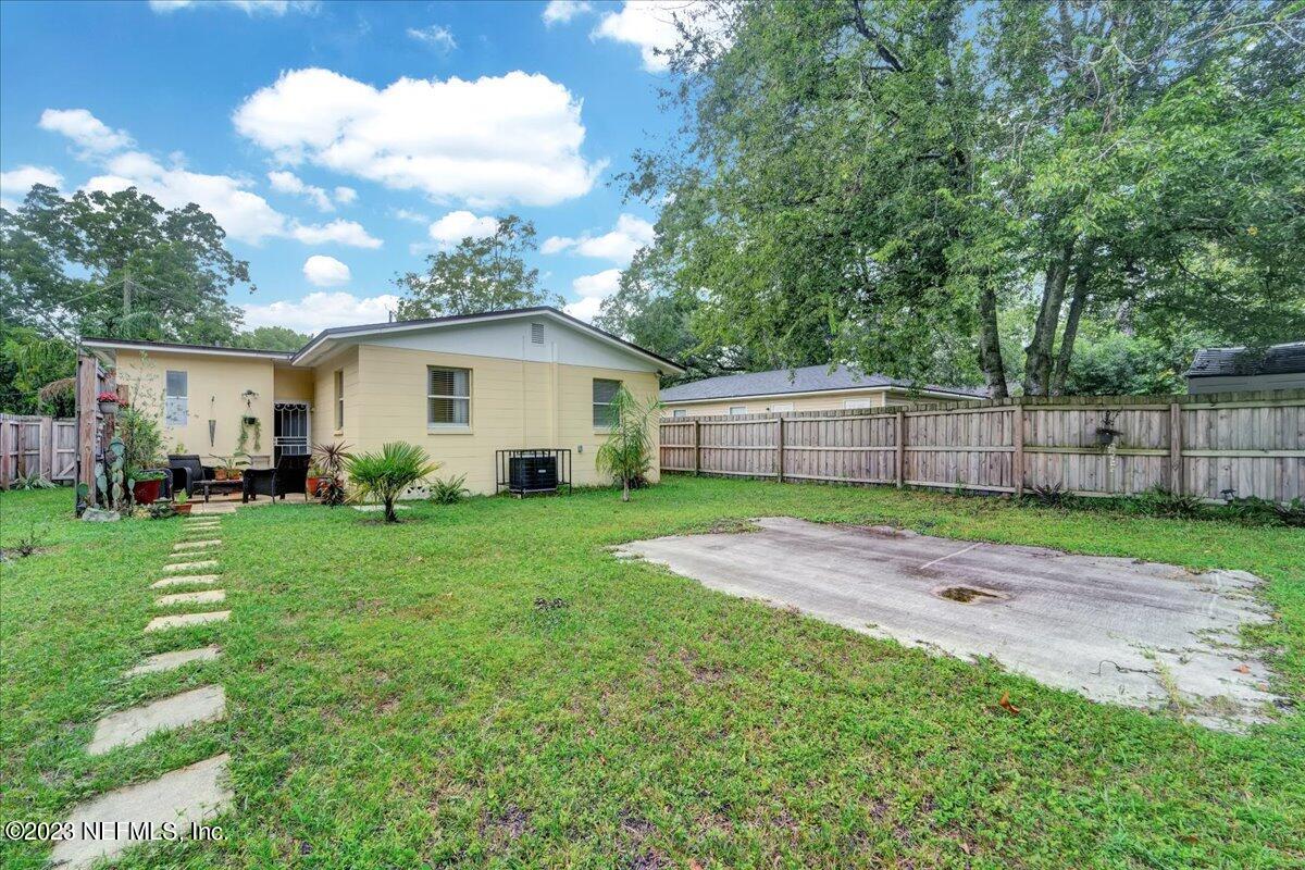 1975 Talladega Road Jacksonville, FL 32209 - Photo 15 of 15 a view of backyard with a garden and entertaining space