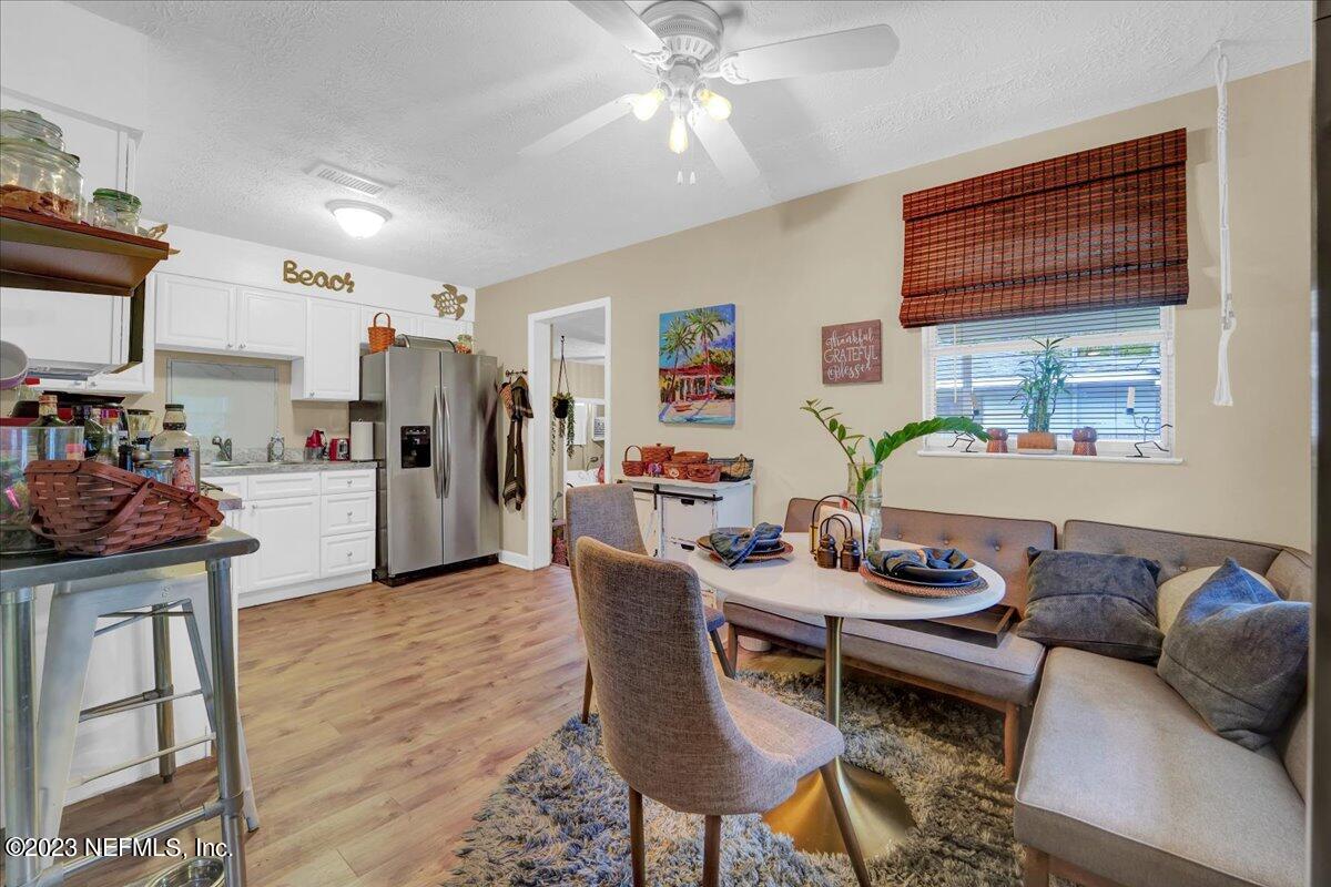1975 Talladega Road Jacksonville, FL 32209 - Photo 3 of 15 a living room with furniture and kitchen view