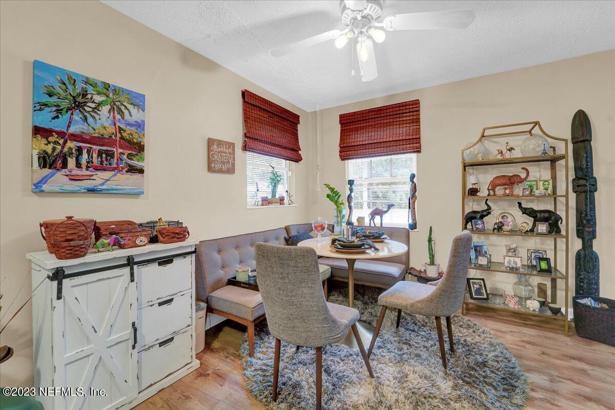1975 Talladega Road Jacksonville, FL 32209 - Photo 4 of 15 a view of a workspace with furniture and a window