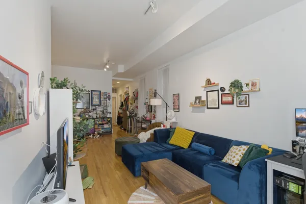 a living room with furniture and a couch