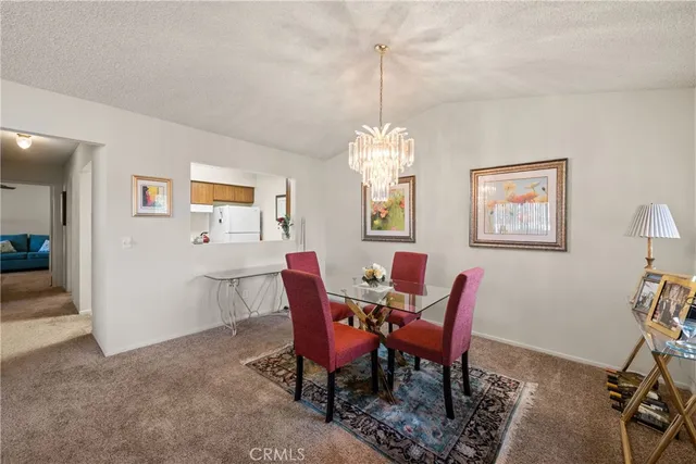 a kitchen that has a sink and a stove