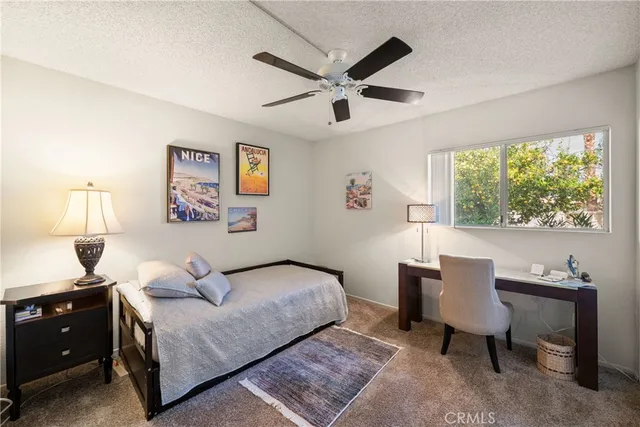 a view of a building with a tree