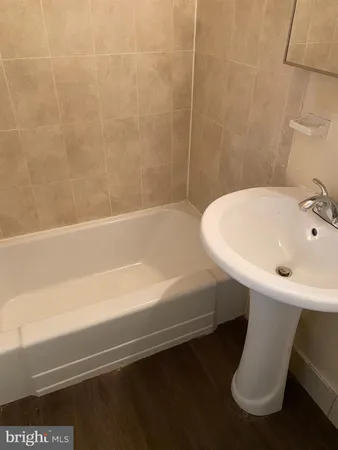a bathroom with a sink and a bathtub