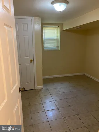 an empty room with a door
