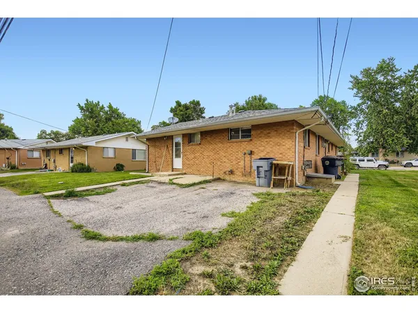 a house view with a backyard space