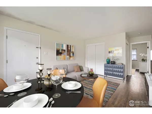 a living room with furniture and a table