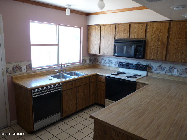 7313 West Hatcher Road Peoria, AZ 85345 - Photo 6 of 13 KITCHEN 2