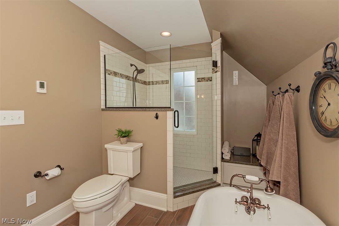 17019 Fernway Road Cleveland, OH 44120 - Photo 21 of 35 Updated bath with double sinks, soaking tub, walk-in shower and heated floors.