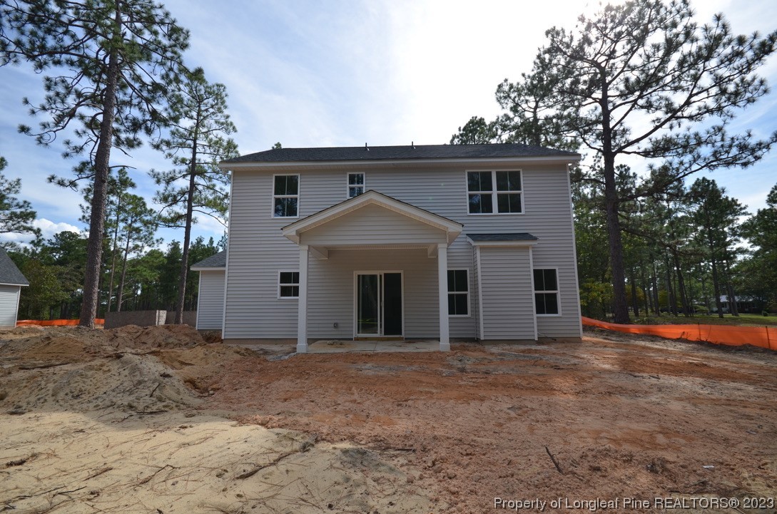 822 Quewhiffle Road Aberdeen, NC 28315 - Photo 7 of 7 a front view of a house with a yard