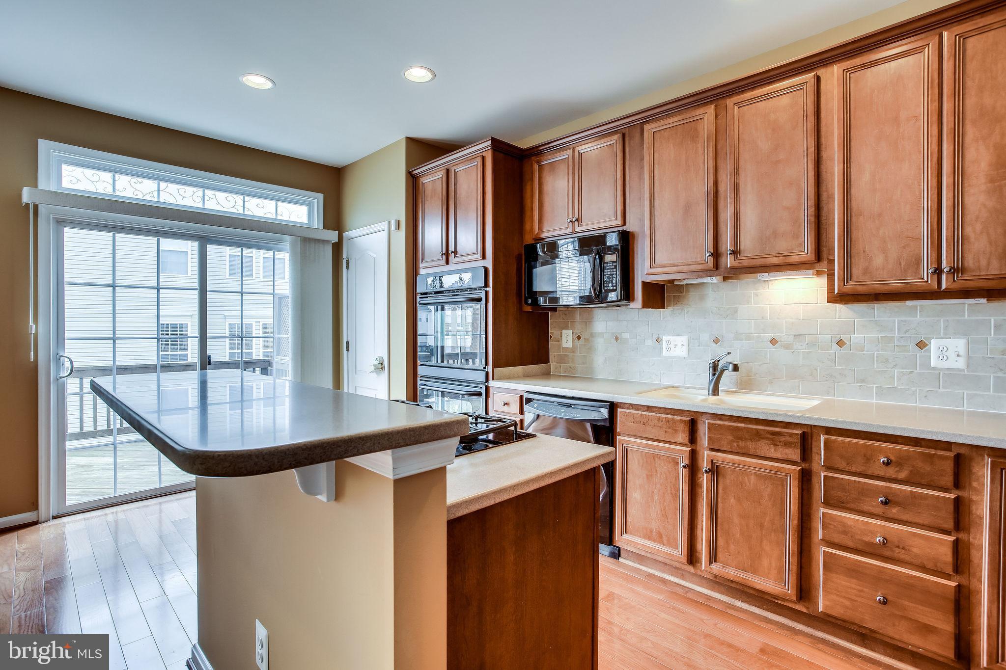 22050 Dilworth Square Broadlands, VA 20148 - Photo 23 of 92 Bright Open Kitchen