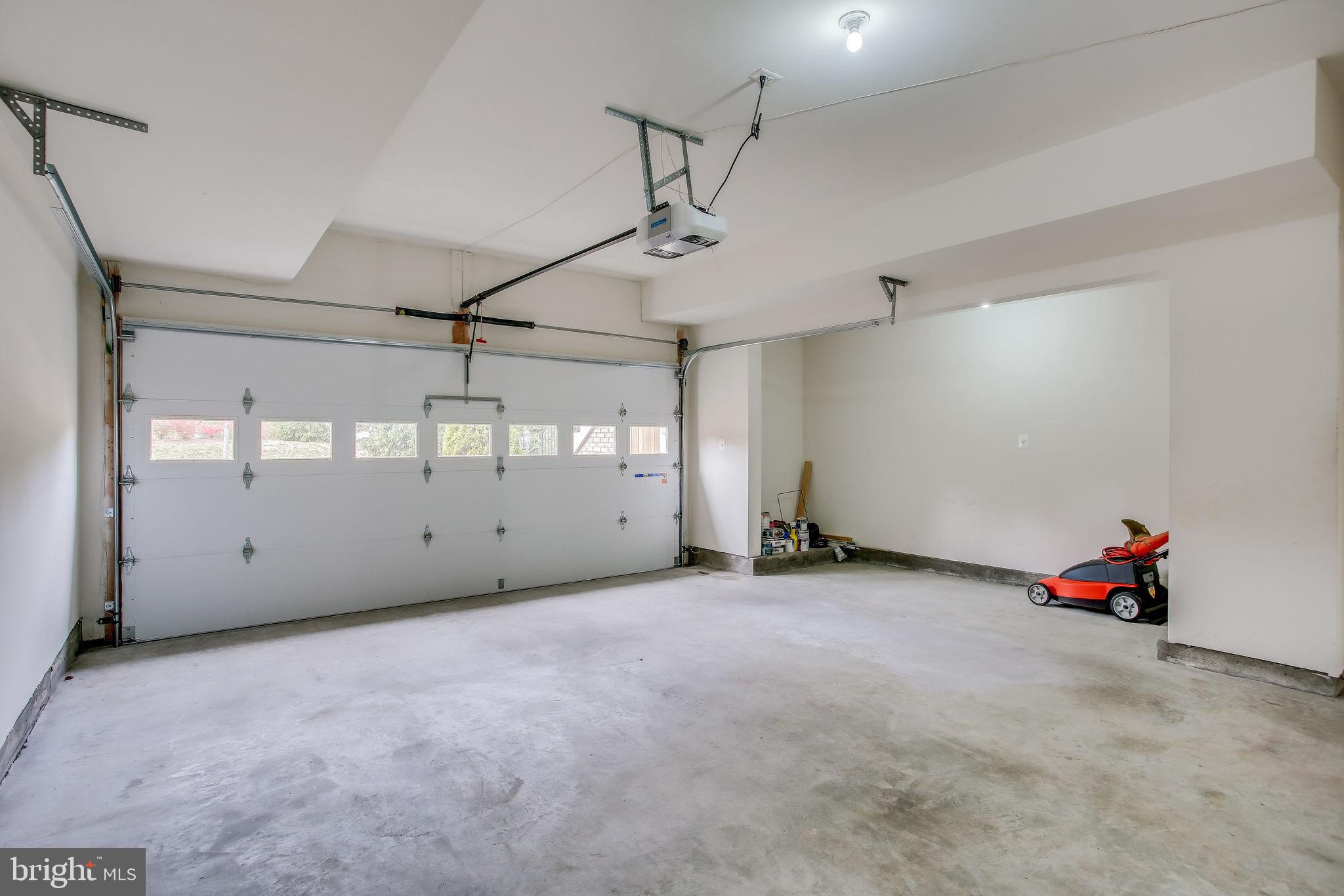 22050 Dilworth Square Broadlands, VA 20148 - Photo 77 of 92 Two-Car Garage with Storage Space