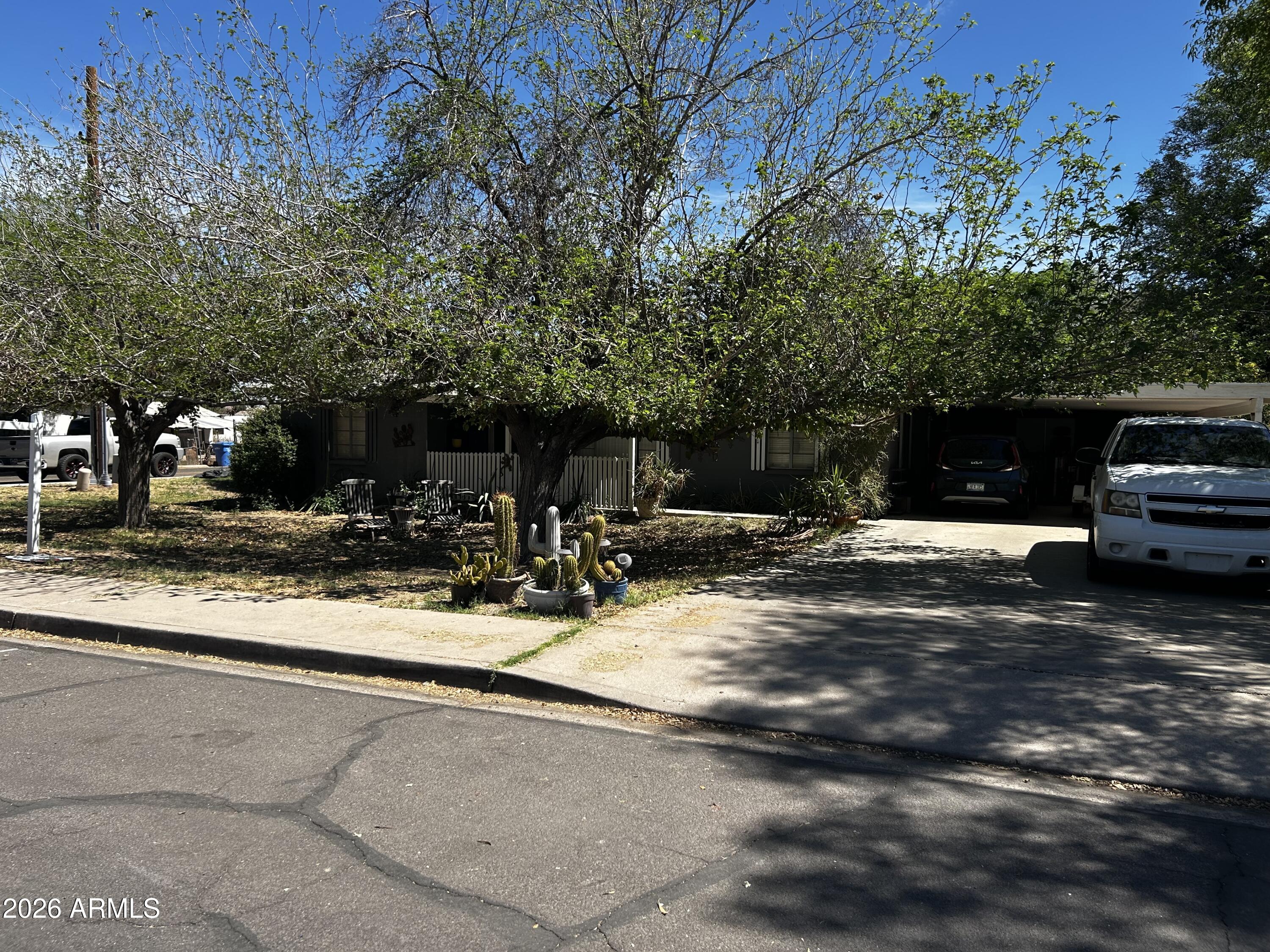 5625 South 9th Street Phoenix, AZ 85040 - Photo 2 of 8 a view of street with trees