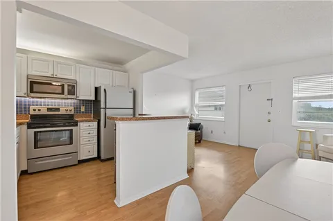 a workspace with furniture and window