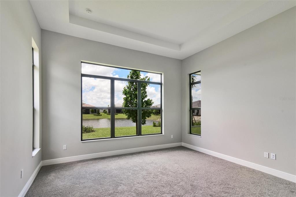 4533 Mondrian Court Sarasota, FL 34240 - Photo 19 of 49 an empty room with windows and view