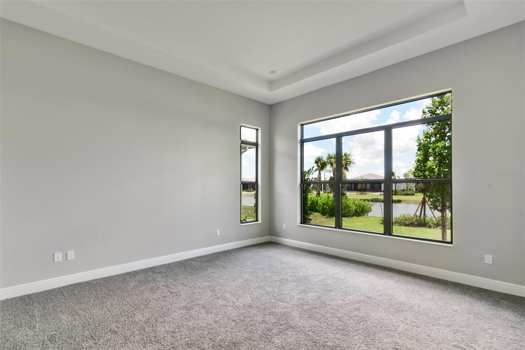 4533 Mondrian Court Sarasota, FL 34240 - Photo 20 of 49 a view of room with window and front door