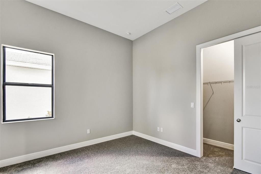 4533 Mondrian Court Sarasota, FL 34240 - Photo 34 of 49 an empty room with a window