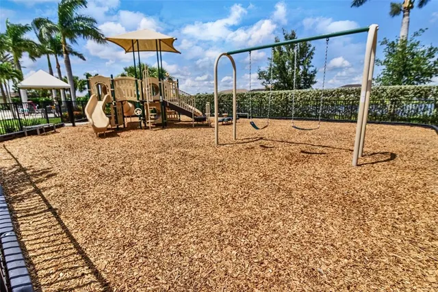 a view of an outdoor space and tennis court