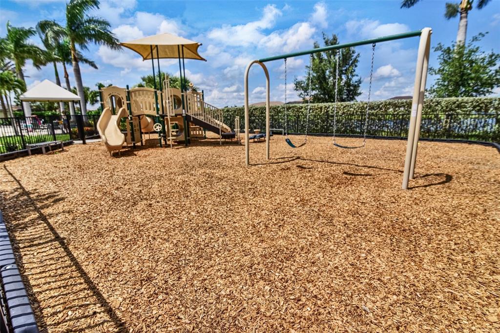 4533 Mondrian Court Sarasota, FL 34240 - Photo 47 of 49 a view of a park with swings and slides