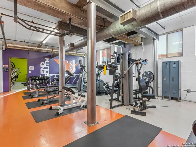 a view of a room with gym equipment