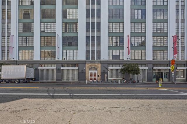 a view of a building and a street