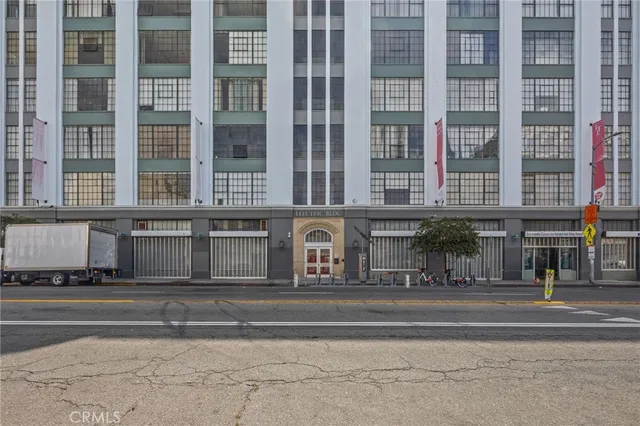 a view of a building and a street