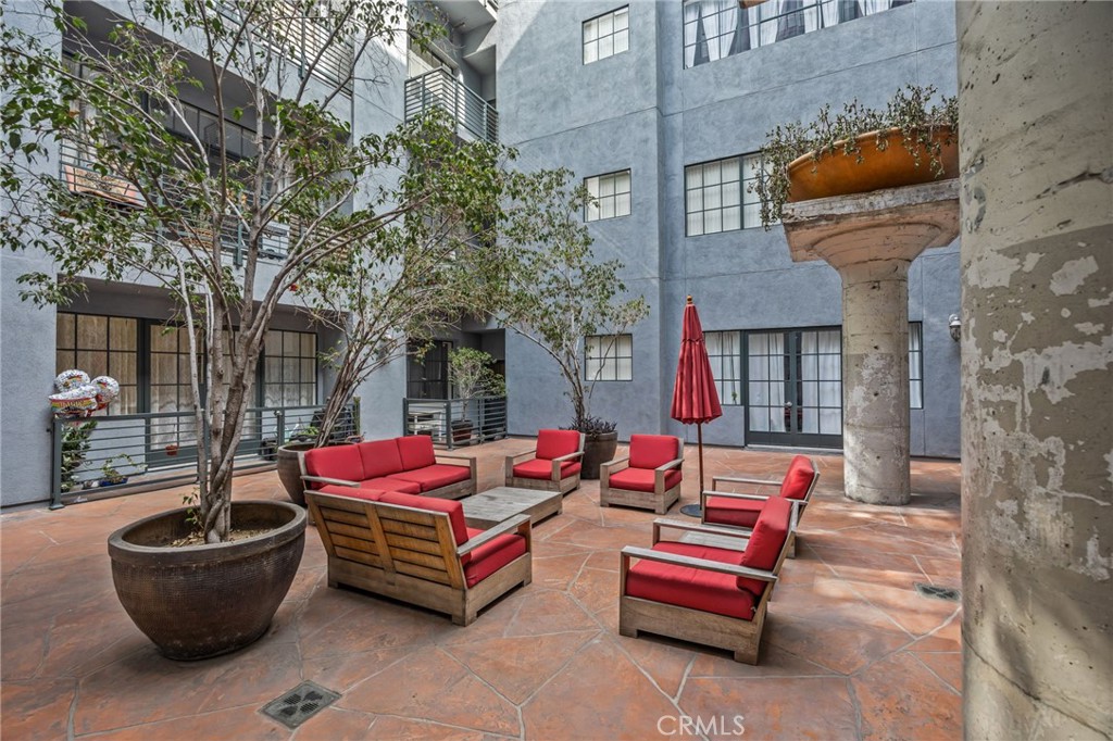 420 San Pedro Street, Unit 218 Los Angeles, CA 90013 - Photo 21 of 27 a outdoor space with patio furniture