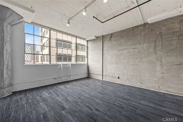 a bedroom with a bed and closet