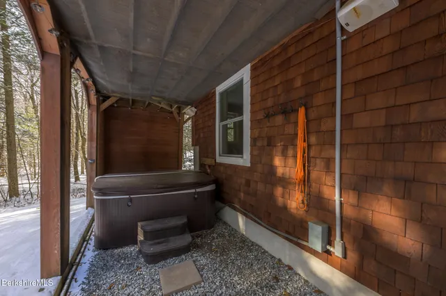 a view of a patio with yard and tree s