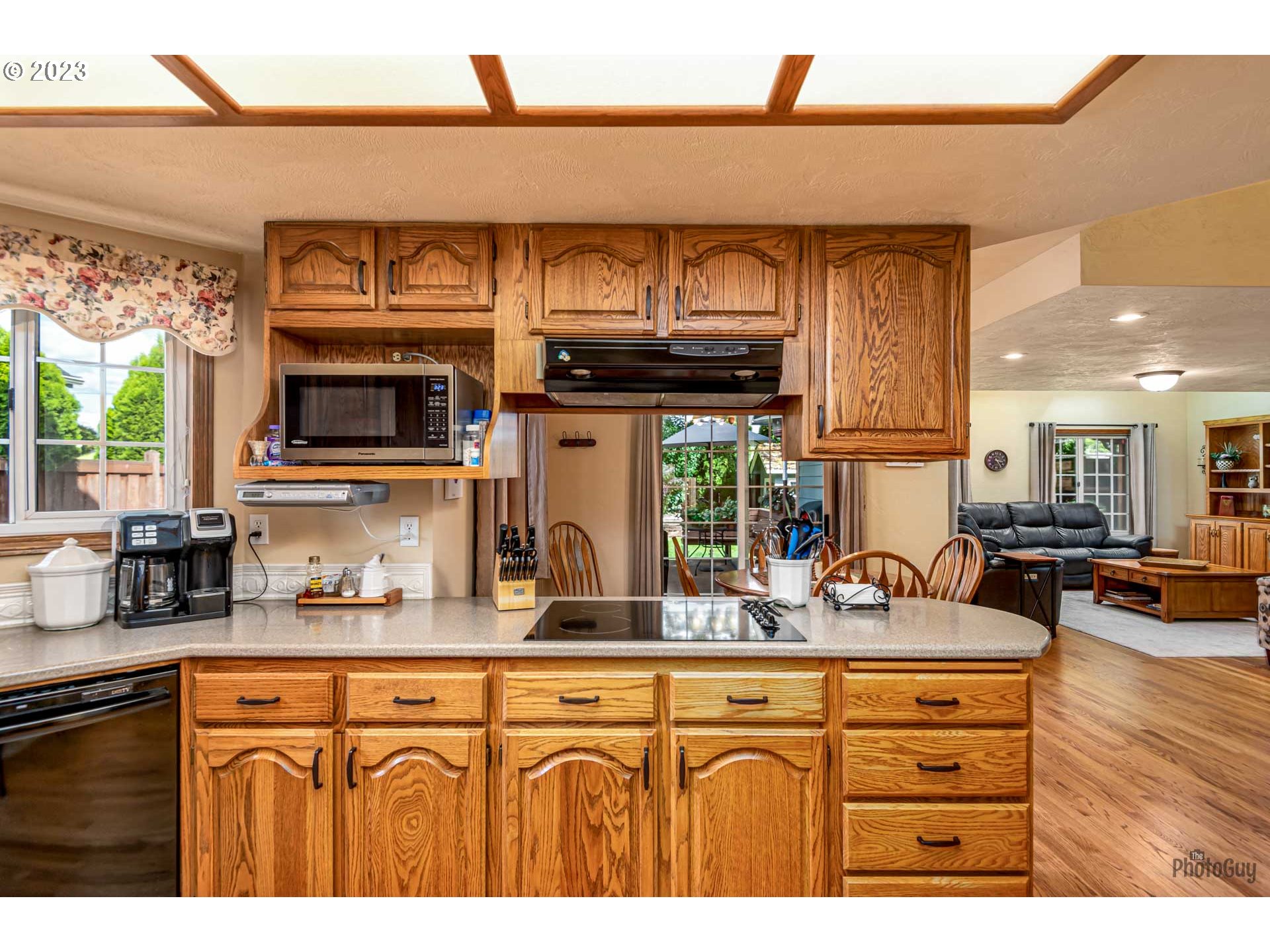 551 68th Place Springfield, OR 97478 - Photo 15 of 45 a kitchen with stainless steel appliances granite countertop a sink and cabinets