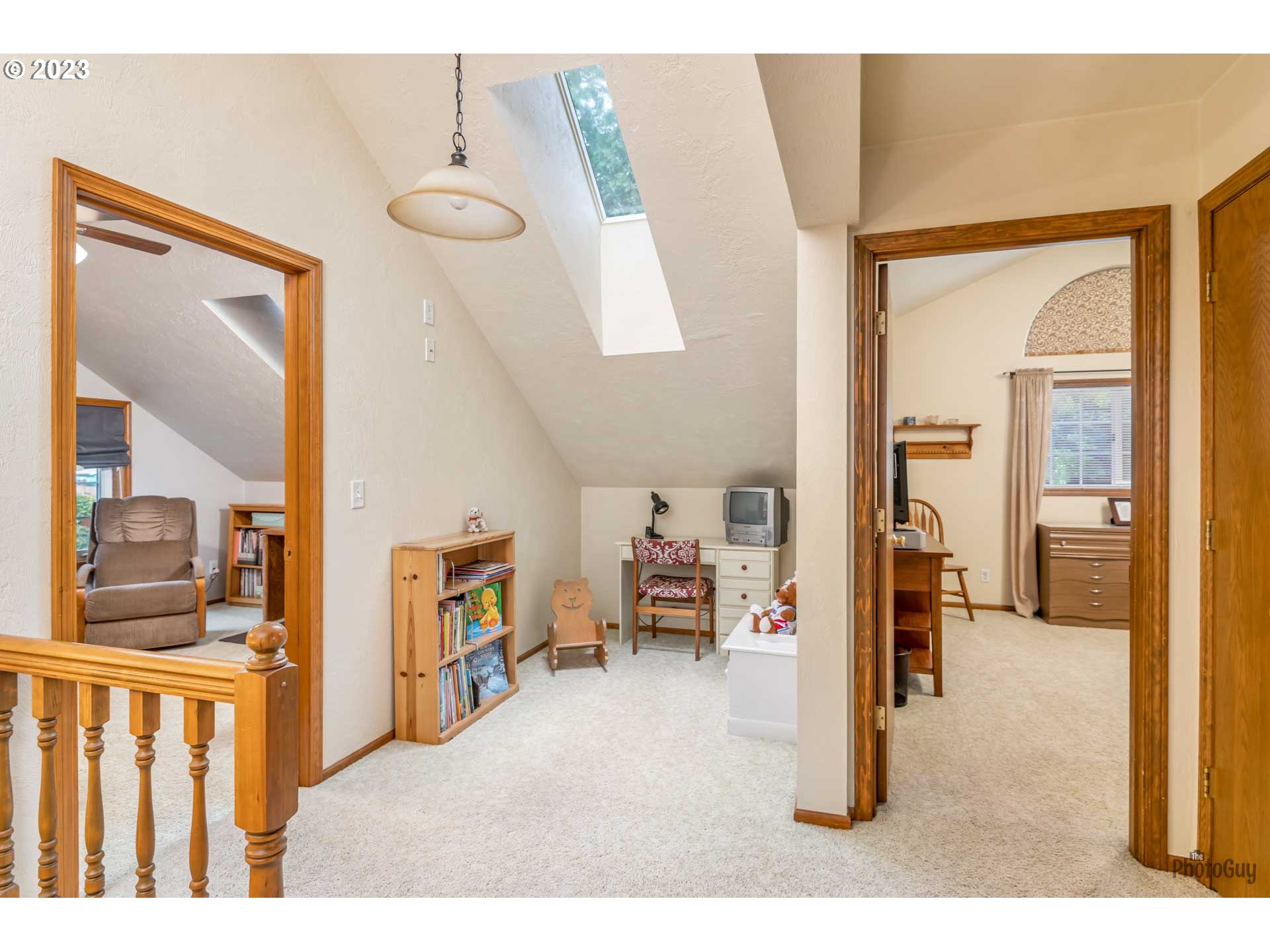 551 68th Place Springfield, OR 97478 - Photo 25 of 45 a living room with furniture and a flat tv screen