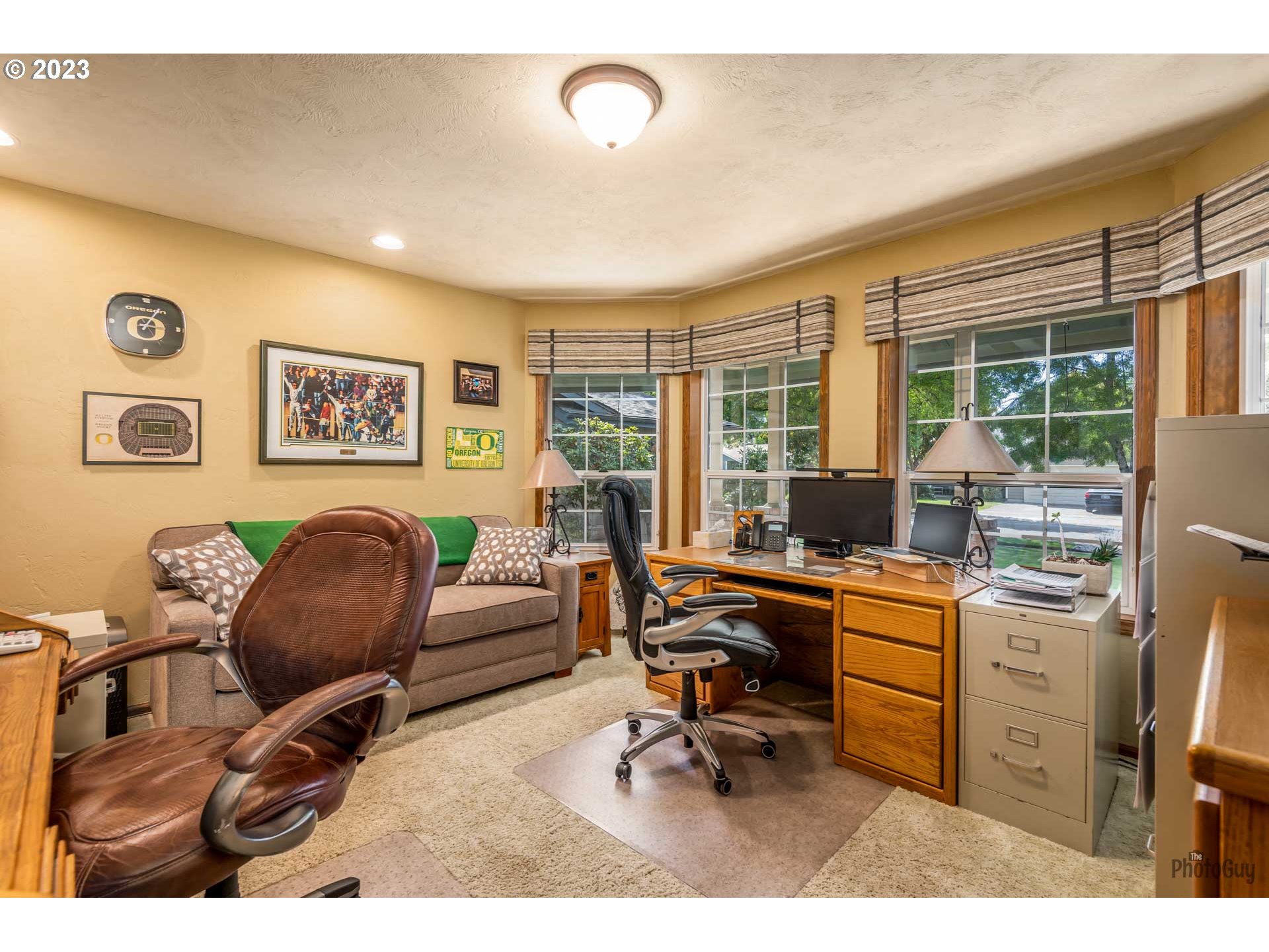 551 68th Place Springfield, OR 97478 - Photo 10 of 45 a work room with furniture and a large window