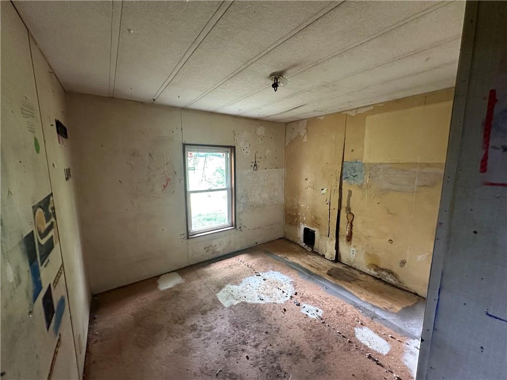 22 Howes Lane Fredericktown, PA 15333 - Photo 24 of 30 a view of an empty room with a window