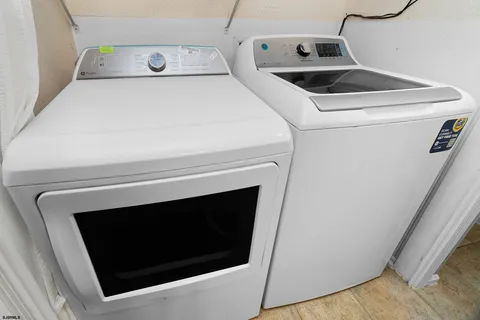 a room with furniture and wooden floor