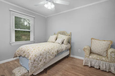 a bedroom with a bed and a table in it