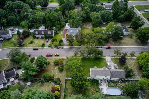a view of a city with lots of trees