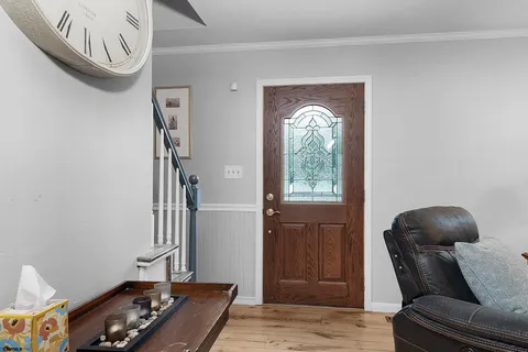 a room with furniture and a window