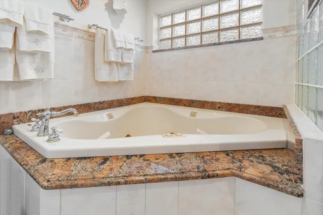 a view of a balcony with furniture