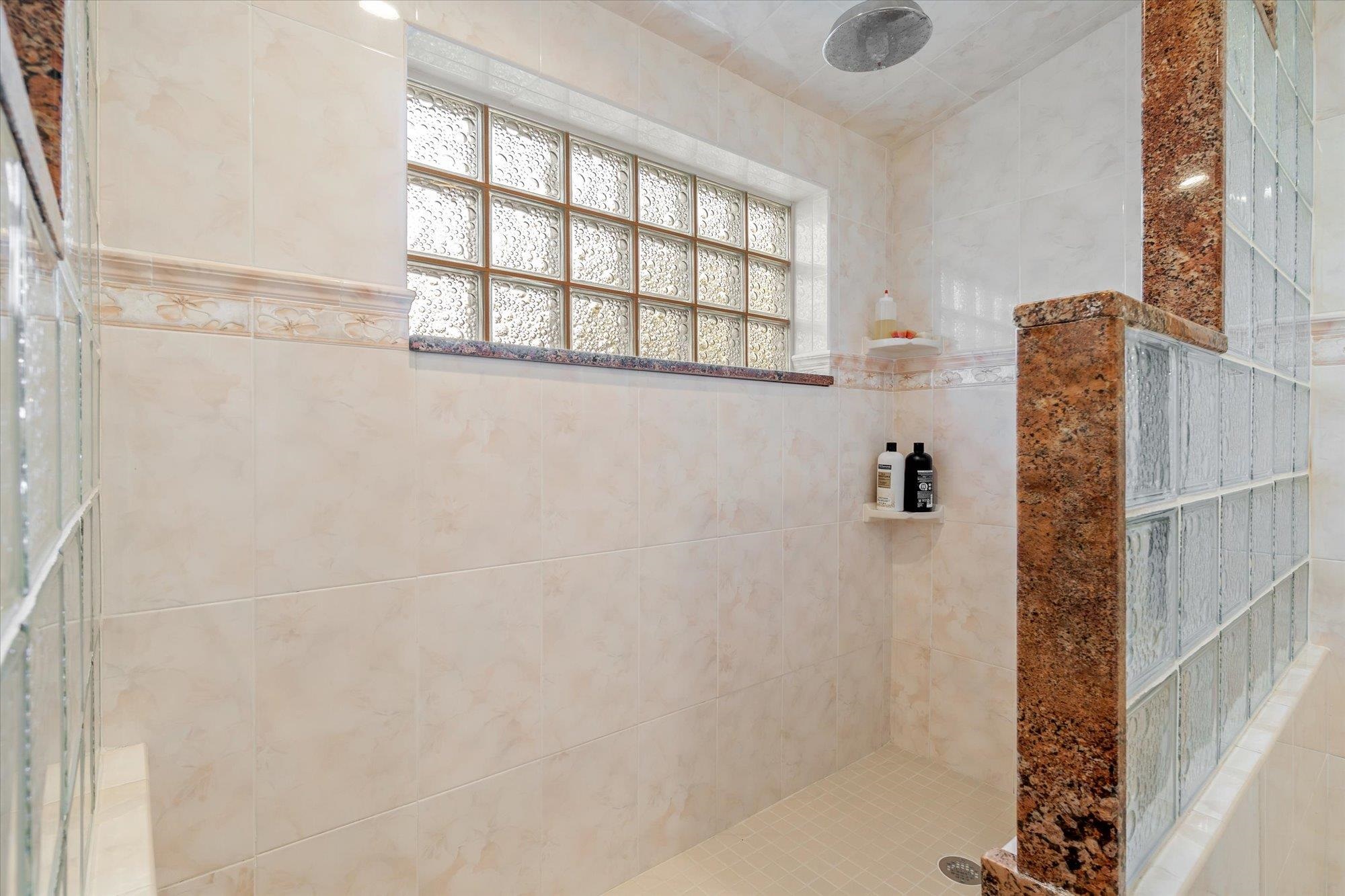 5042 Atlantic View St. Augustine, FL 32080 - Photo 25 of 72 Bathroom with tiled shower