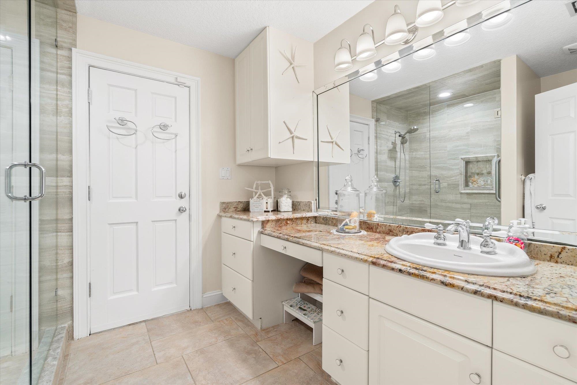 5042 Atlantic View St. Augustine, FL 32080 - Photo 41 of 72 Full bath with vanity, a stall shower, and light tile patterned floors