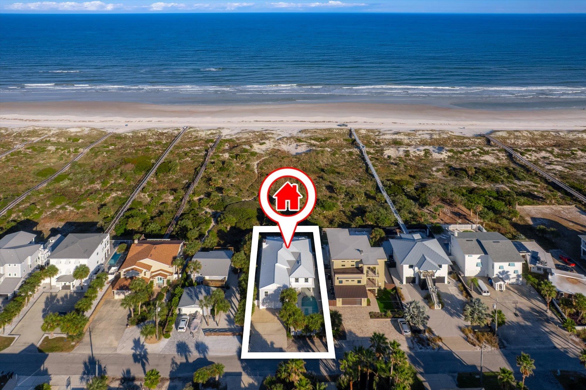 5042 Atlantic View St. Augustine, FL 32080 - Photo 50 of 72 Aerial view of property and surrounding area with a nearby body of water and nearby suburban area
