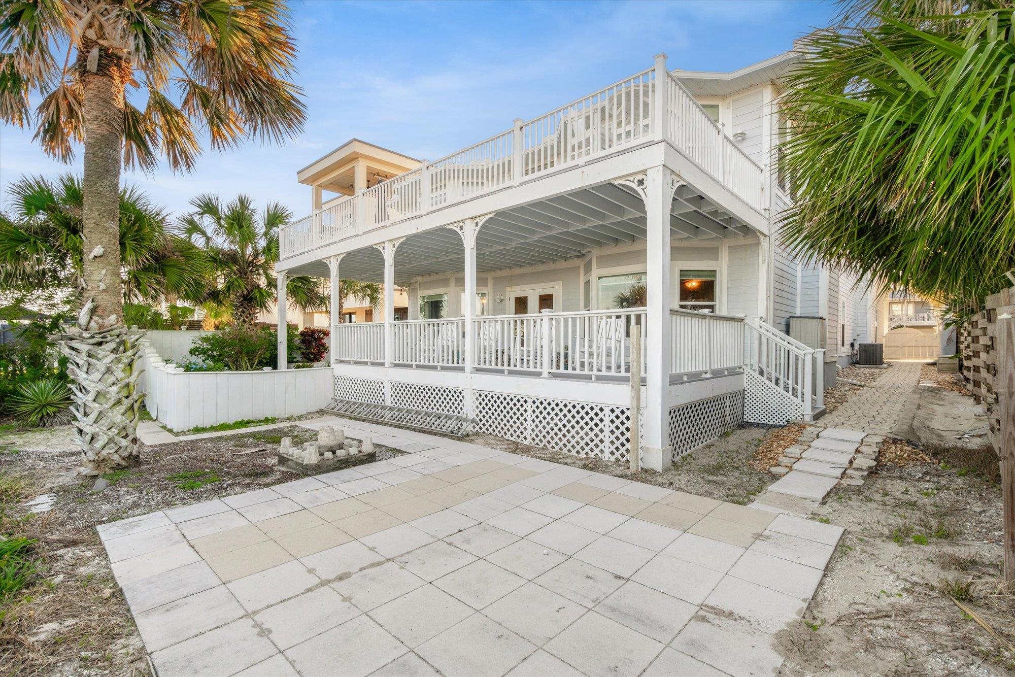 5042 Atlantic View St. Augustine, FL 32080 - Photo 52 of 72 Back of house with a patio and covered porch