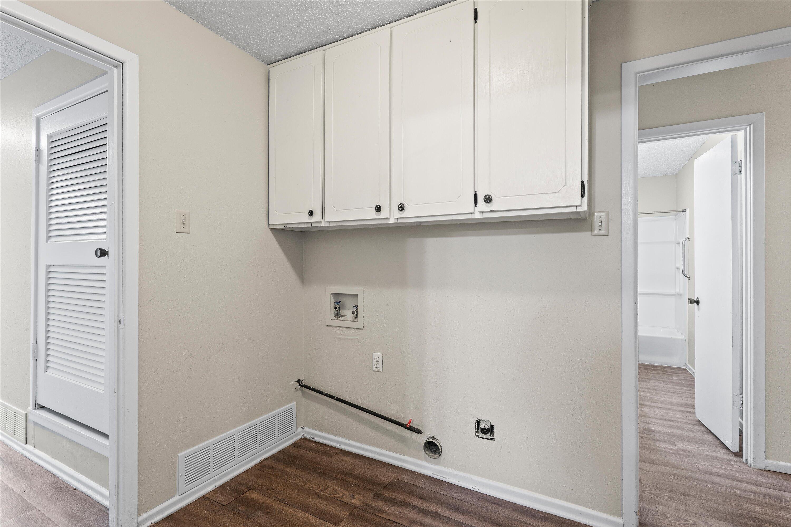 4520 54th Street Lubbock, TX 79414 - Photo 12 of 32 a view of room with wooden floor