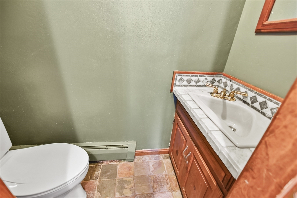 28 Adams Road Hubbardston, MA 01452 - Photo 27 of 35 a bathroom with a sink and a toilet