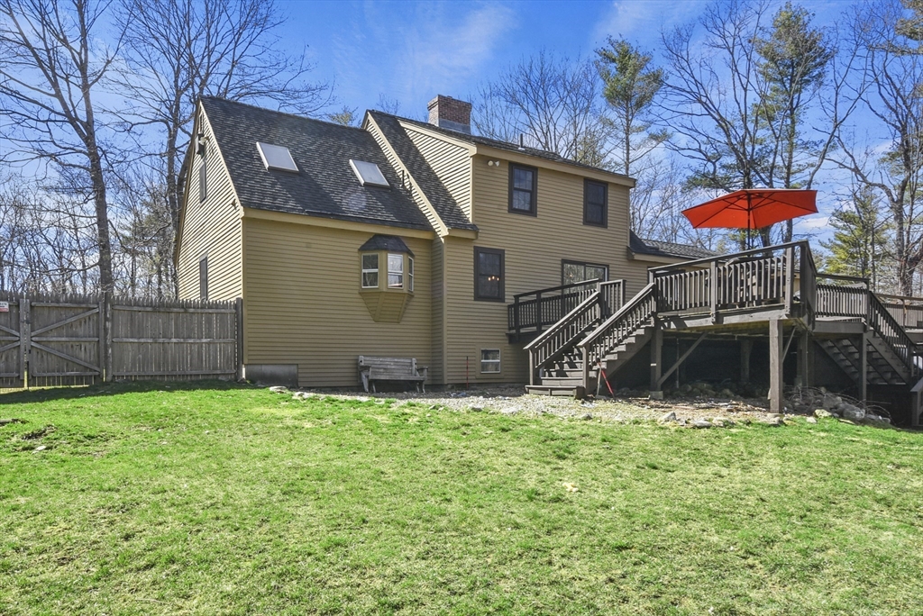 28 Adams Road Hubbardston, MA 01452 - Photo 34 of 35 a front view of a house with a yard